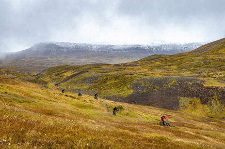 In the afternoon, hike or e-bike along fiery hillsides and pause for a picnic beside Lake Stífluvatn